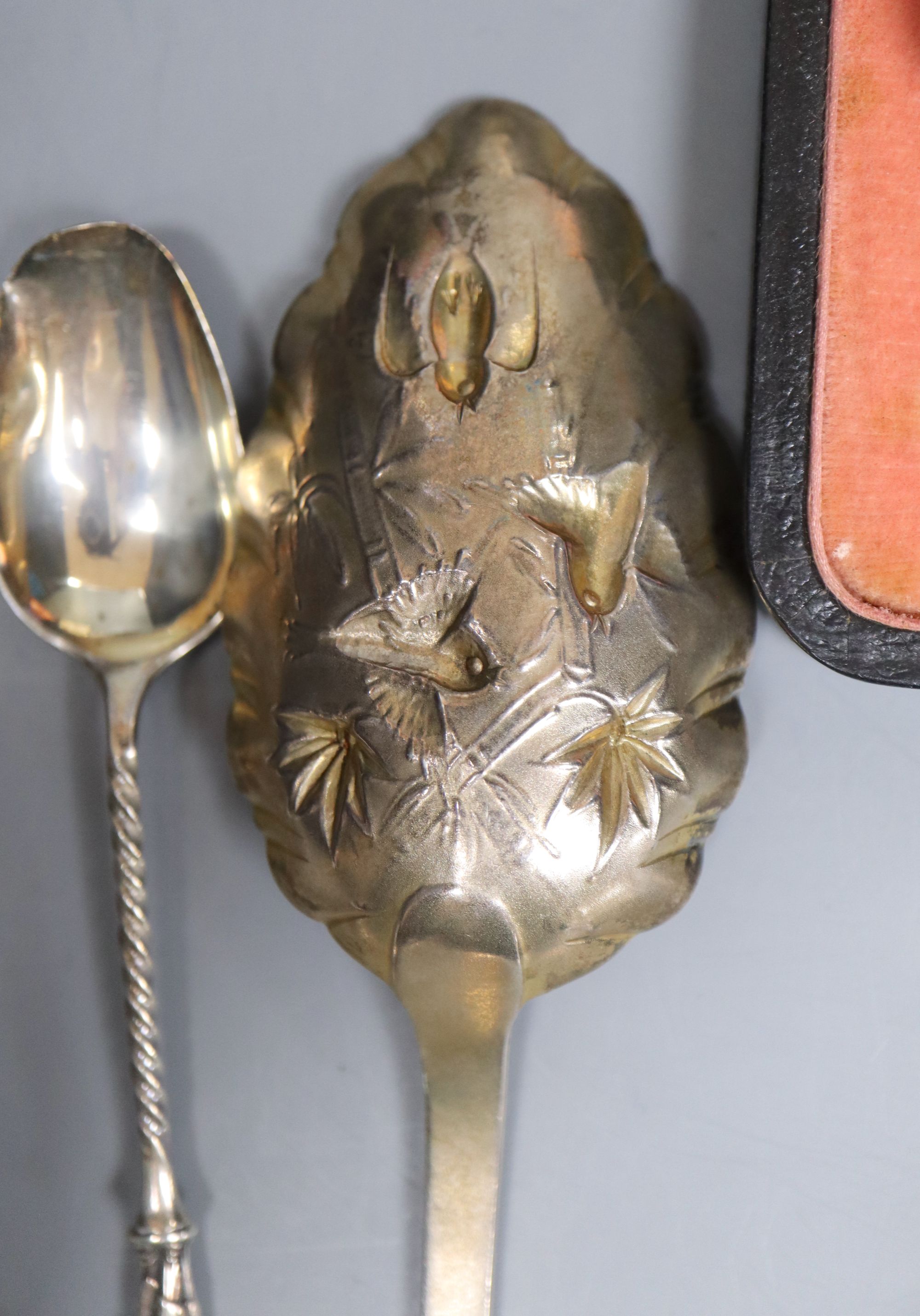 Small silver - 2 berry spoons, butter knife, ladle, feeder, christening spoon and fork. Two cased sets, tongs and a silver gilt spoon